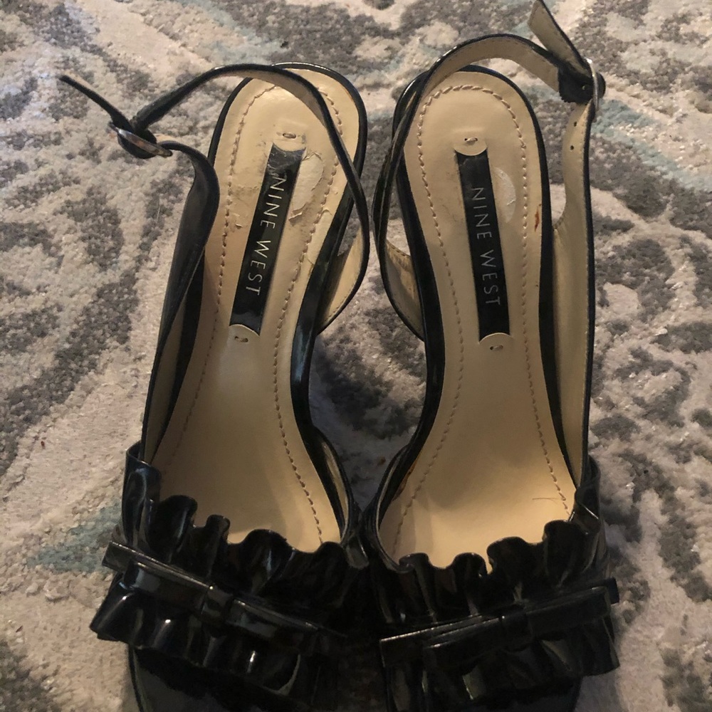 Black, sandals, slightly worn.